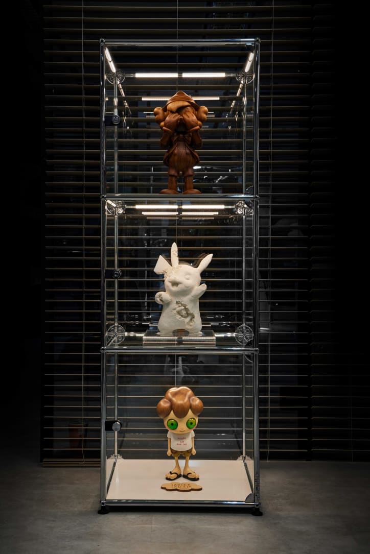 From top to bottom: Kaws, Wooden Pinocchio (Ed. 100), 2018; Daniel Arsham, Crystalized Pikachu (Ed.500), 2020; Javier Calleja, Missing the Blue Sky (Ed. 200), 2017. Photography of Lin Yuehong. Courtesy of Tatler Asia.