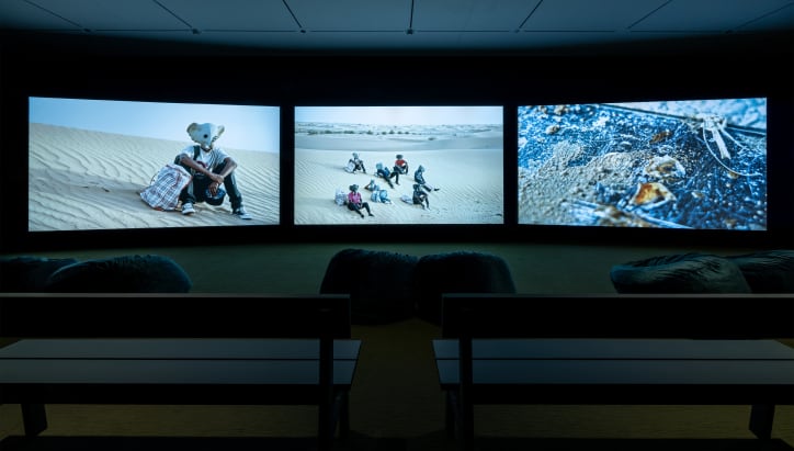 John Akomfrah, Four Nocturnes, 2019, installed in 'John Akomfrah: Four Nocturnes', at Wrightwood 659, 2024. © 2024 Alphawood Exhibitions LLC, Chicago. Courtesy: Alphawood Exhibitions LLC, Chicago. Photograph by Michael Tropea.