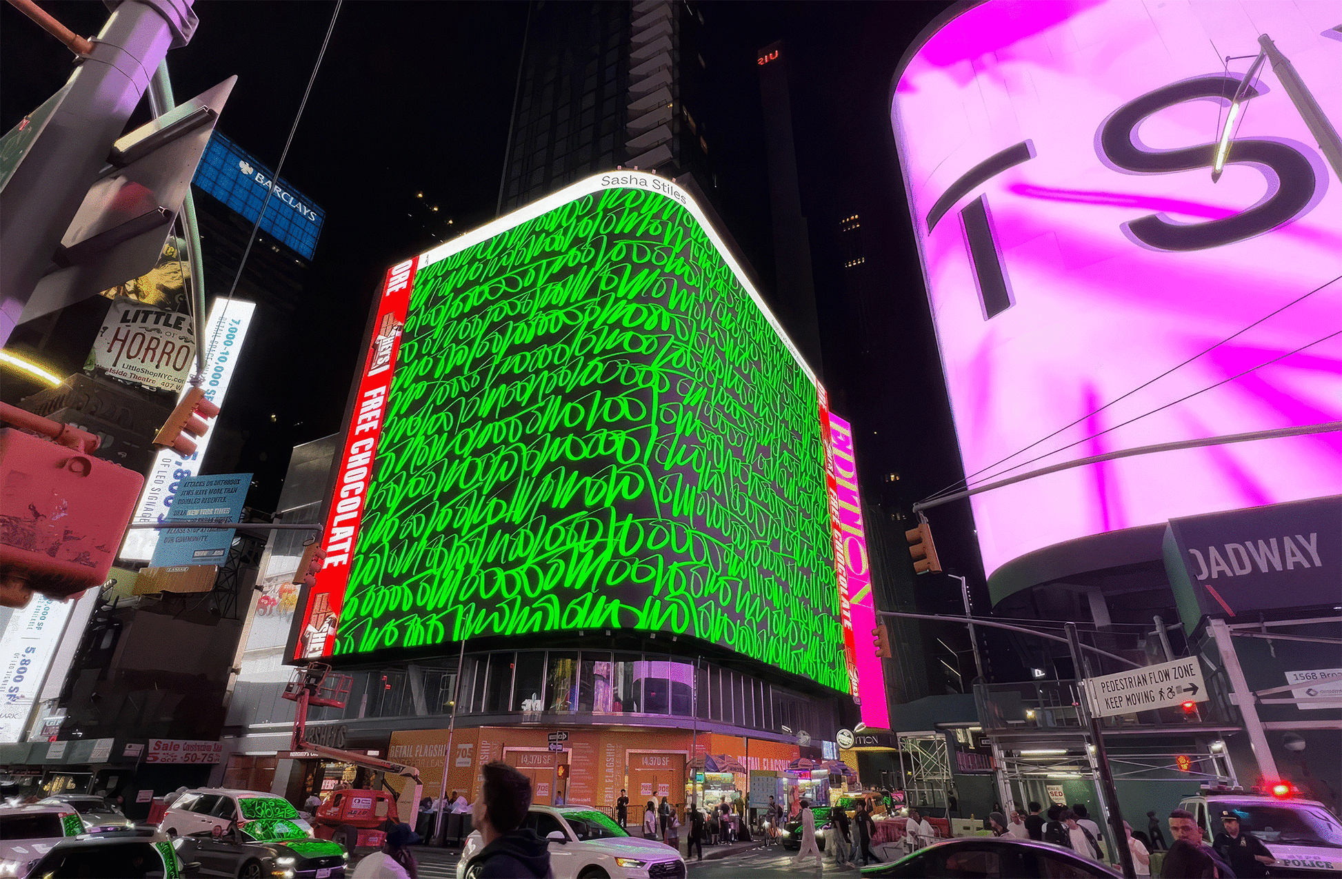 Installation view of Sasha Stiles, Cursive Binary in Time Square, New York City, during the Art Crush World Tour 2023. Courtesy of the artist. 