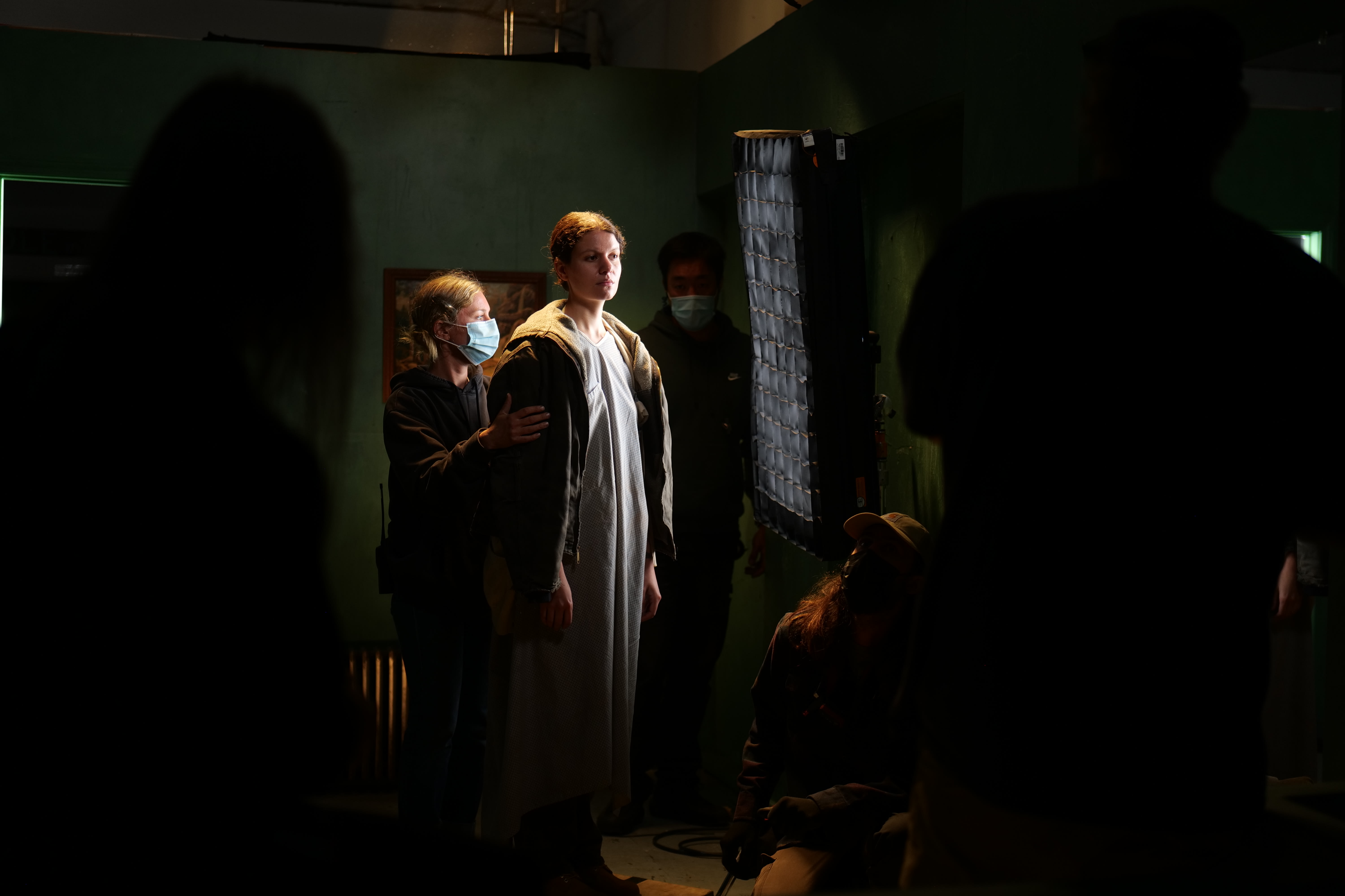 Production still: Ariana Taylor, Casting Assistant, with model on the set of Eveningside Tattoo, 2021. Photograph by Harper Glantz © Crewdson Studio