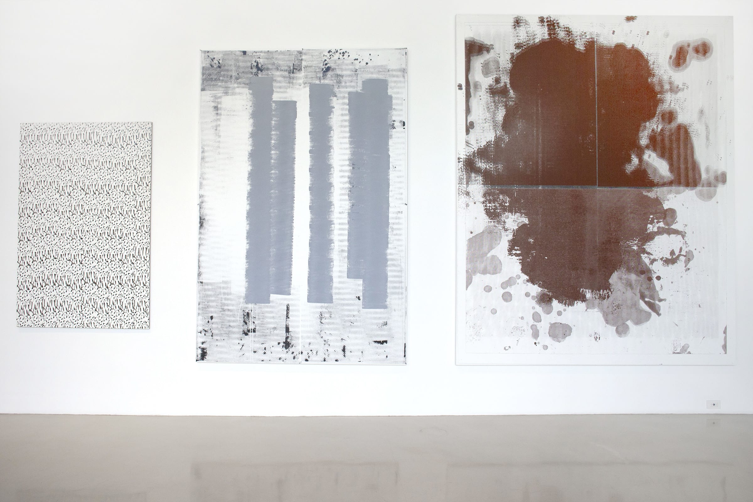 Installation view of Christopher Wool, Untitled, 1988 (left); Untitled (H.H.), 2003 (middle); and Untitled, 2011 (right). Courtesy of the de la Cruz Collection.