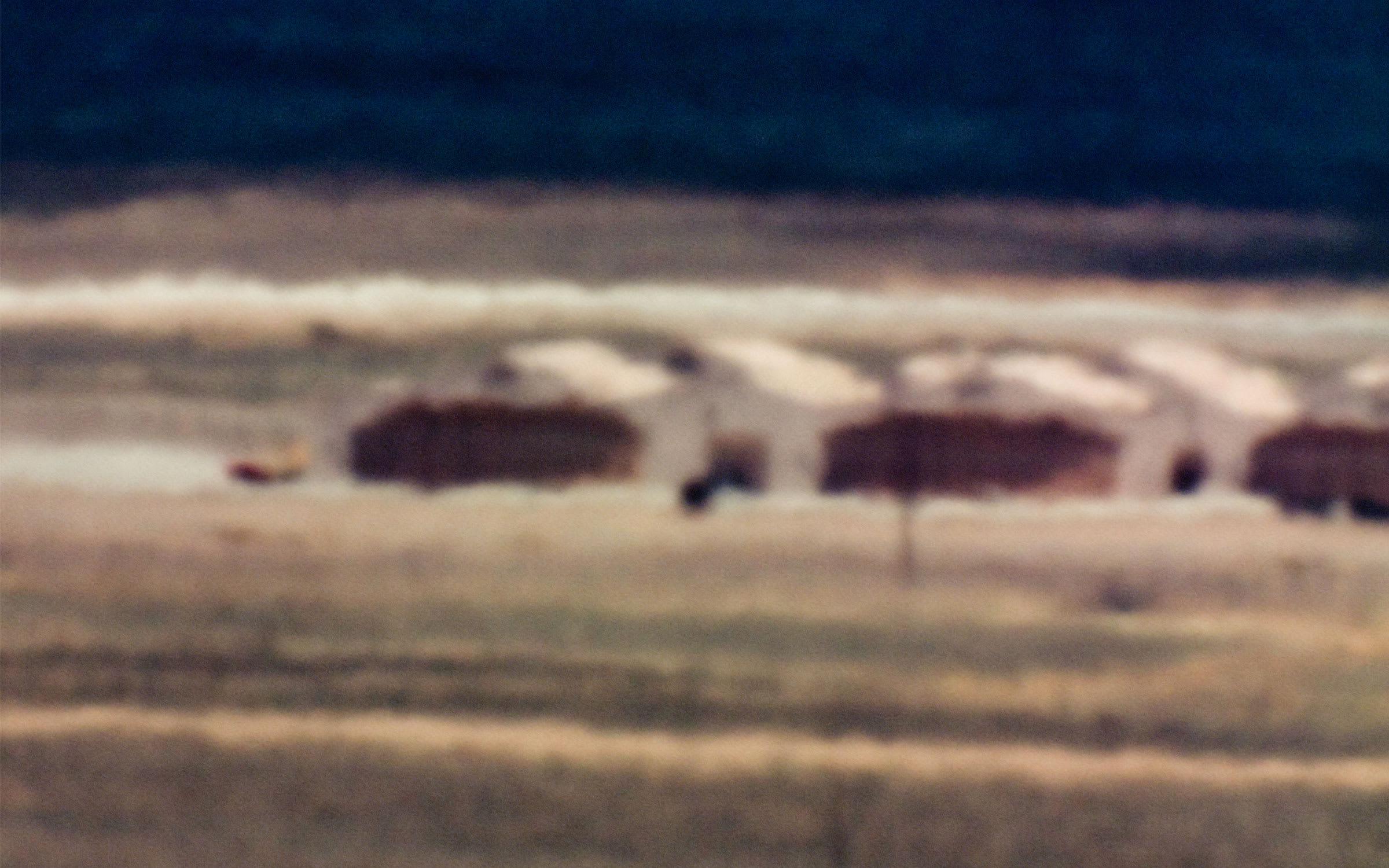 Trevor Paglen, Canyon Hangars and Unidentified Vehicle; Tonopah Test Range, NV; Distance approx. 18 miles; 12:45 pm, 2006. Courtesy of the artist, Metro Pictures, New York, Altman Siegel, San Francisco.