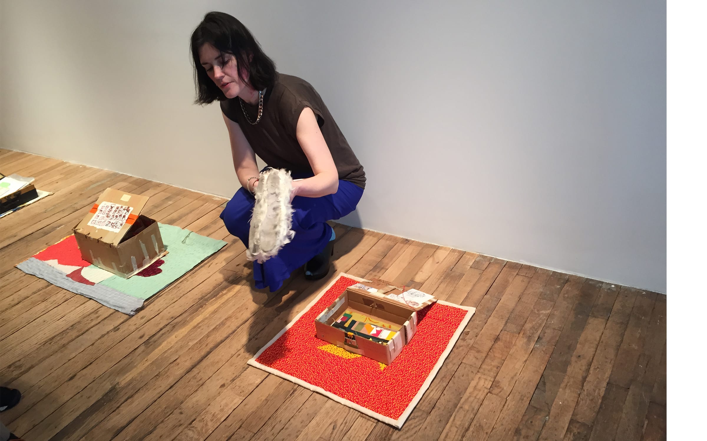 Bridget Donahue installing one of Susan Cianciolo’s kits for her first solo exhibition with the gallery, ‘if God COMes to visit You, HOW will you know? (the great tetrahedral kite)’ in 2015. Courtesy of the artist and Bridget Donahue, New York City.