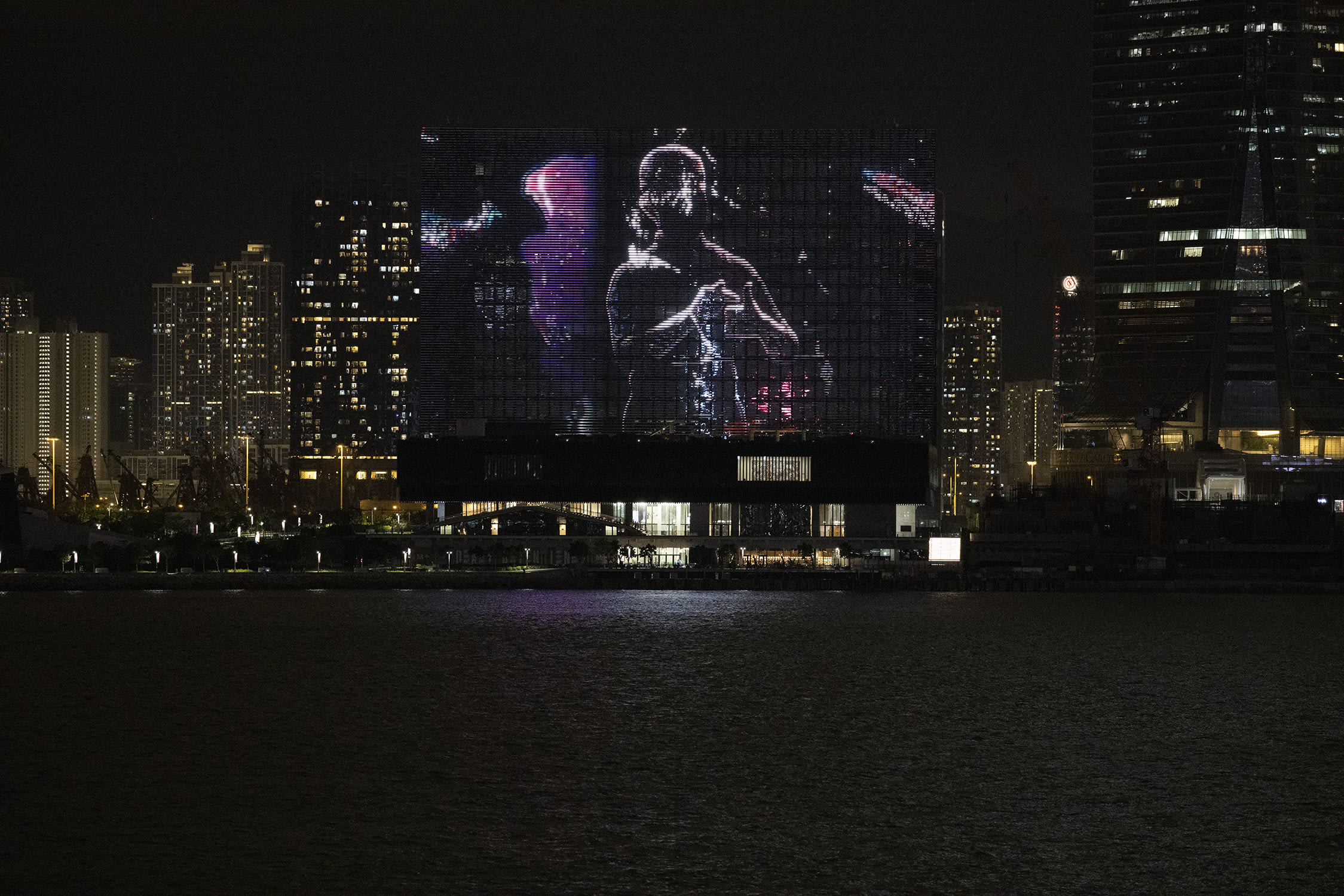 Screening of Ellen Pau's The Shape of Light on the M+ Facade, 2022. Photo by Lok Cheng. Courtesy of Ellen Pau and M+, Hong Kong.