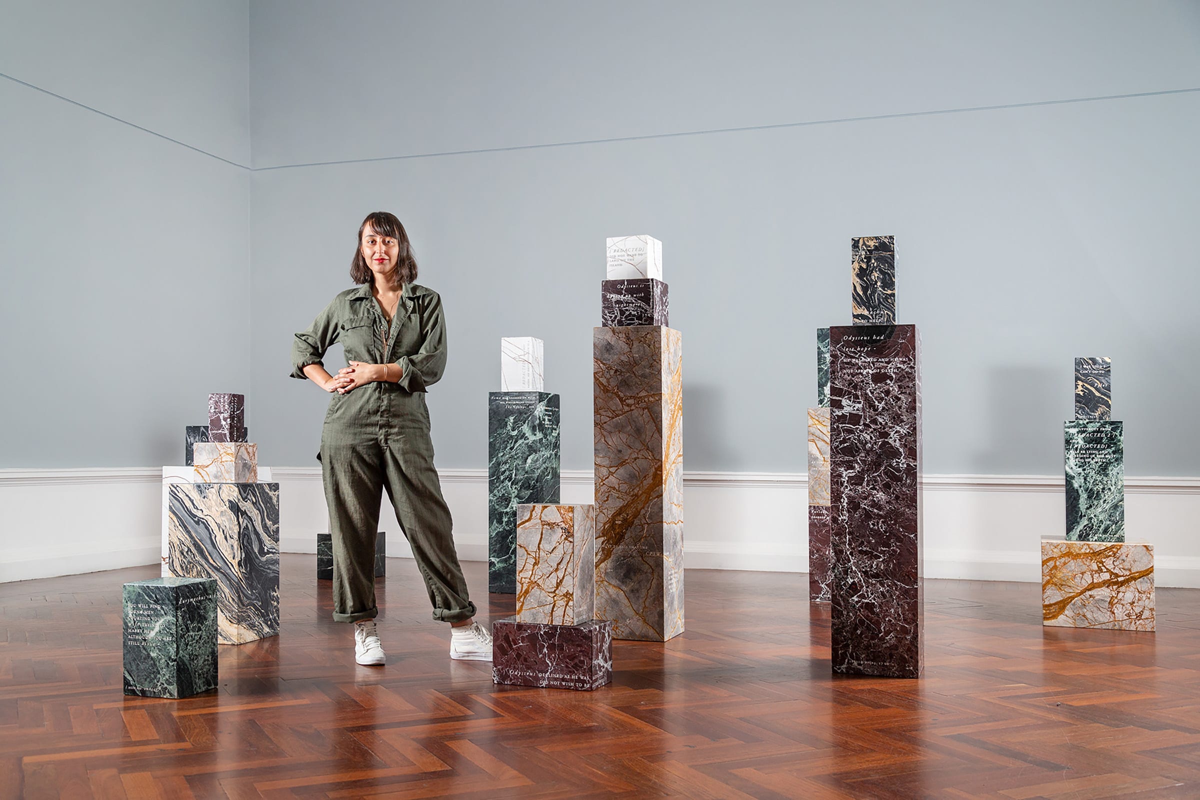 Stanislava Pinchuk with her work The Wine Dark Sea, set I at Art Gallery of South Australia, 2021. Photo by Saul Steed. Courtesy of the artist, Art Gallery of South Australia, and Yavuz Gallery.