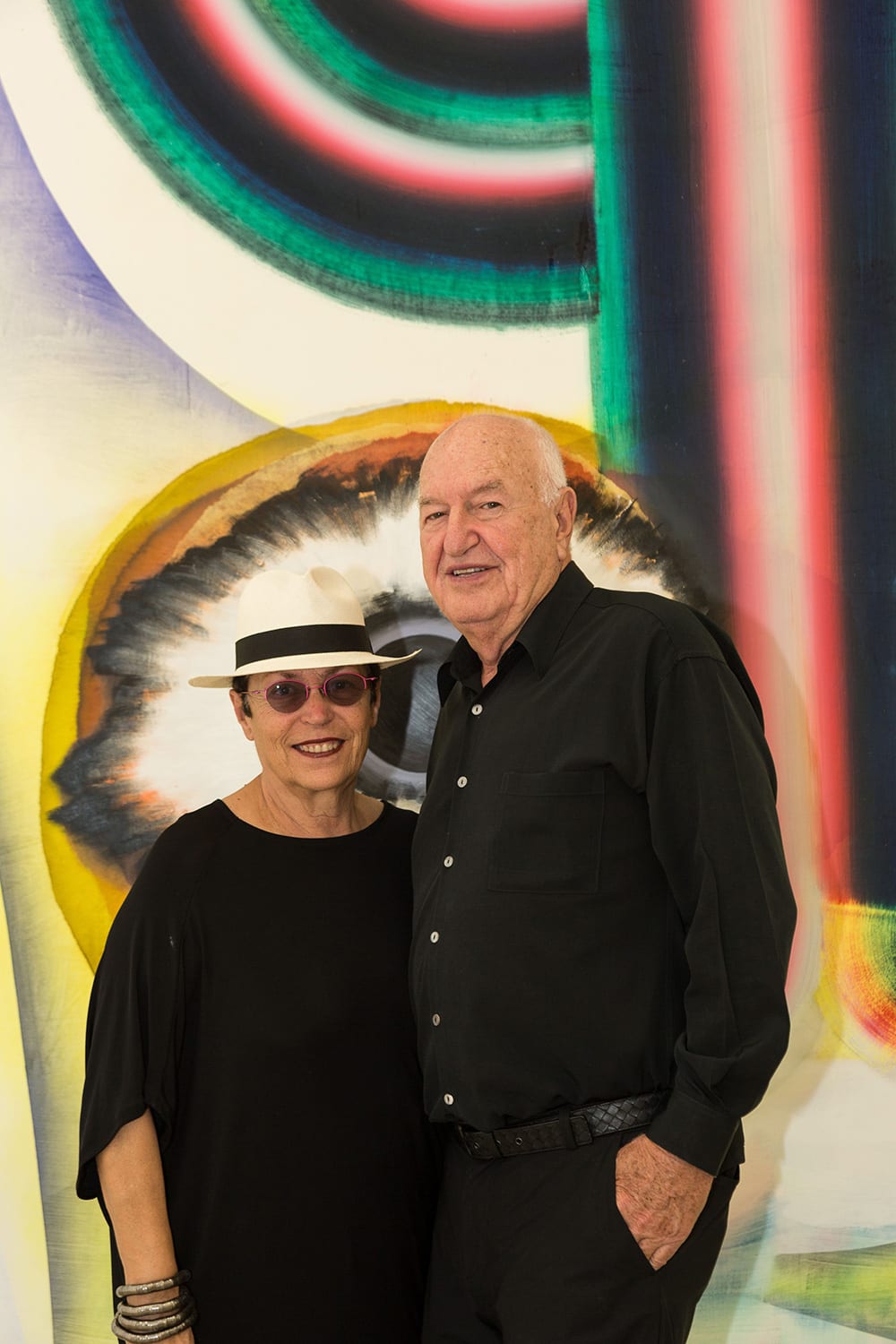 Mera and Don Rubell in front of Kerstin Brätsch’s artwork When You See Me Again It Wont Be Me (from Broadwaybratsch/Corporate Abstraction series), 2010. Photo Credit: Chi Lam.