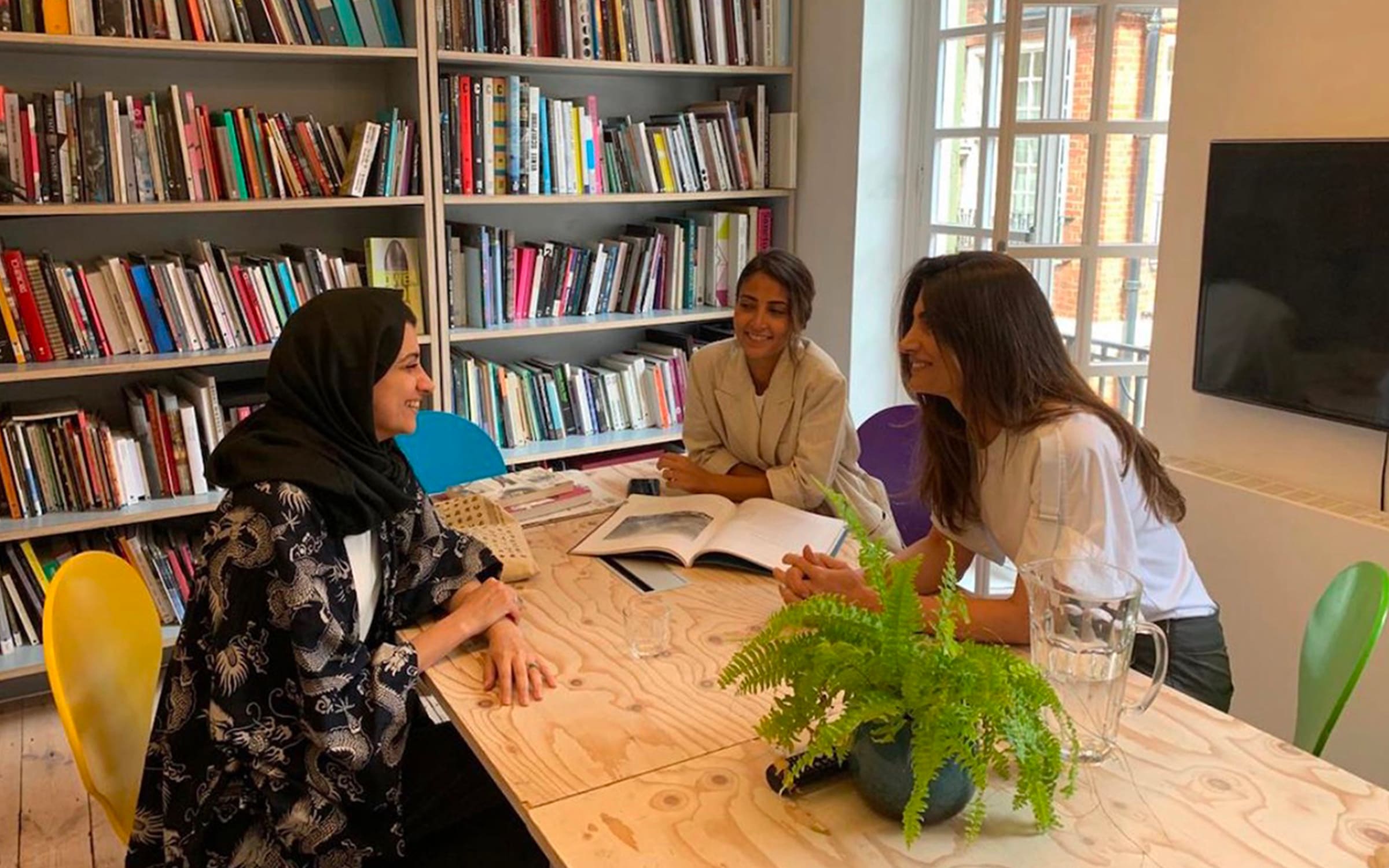 'Studio visit' with artist in residence Marwah AlMugait. Courtesy of the Delfina Foundation.