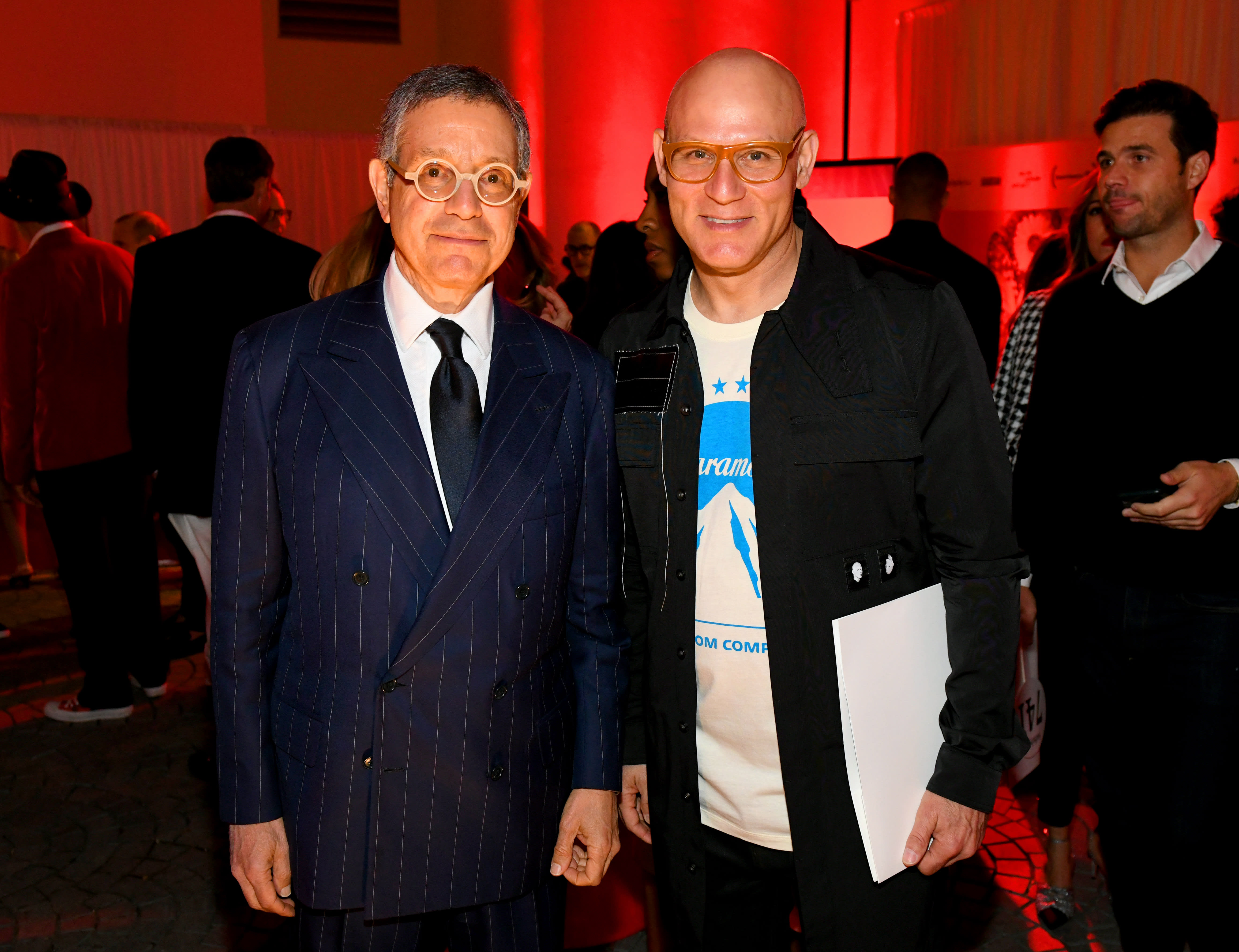 Jeffrey Deitch and Craig Robins at RED Auction hosted by Bono at the Miami Design District, 2018. Photo by World Red Eye.