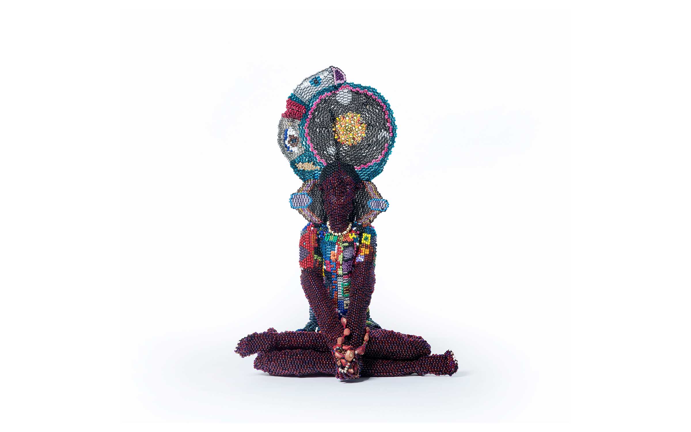 Flamboyant sculptor Joyce J. Scott on doing away with African