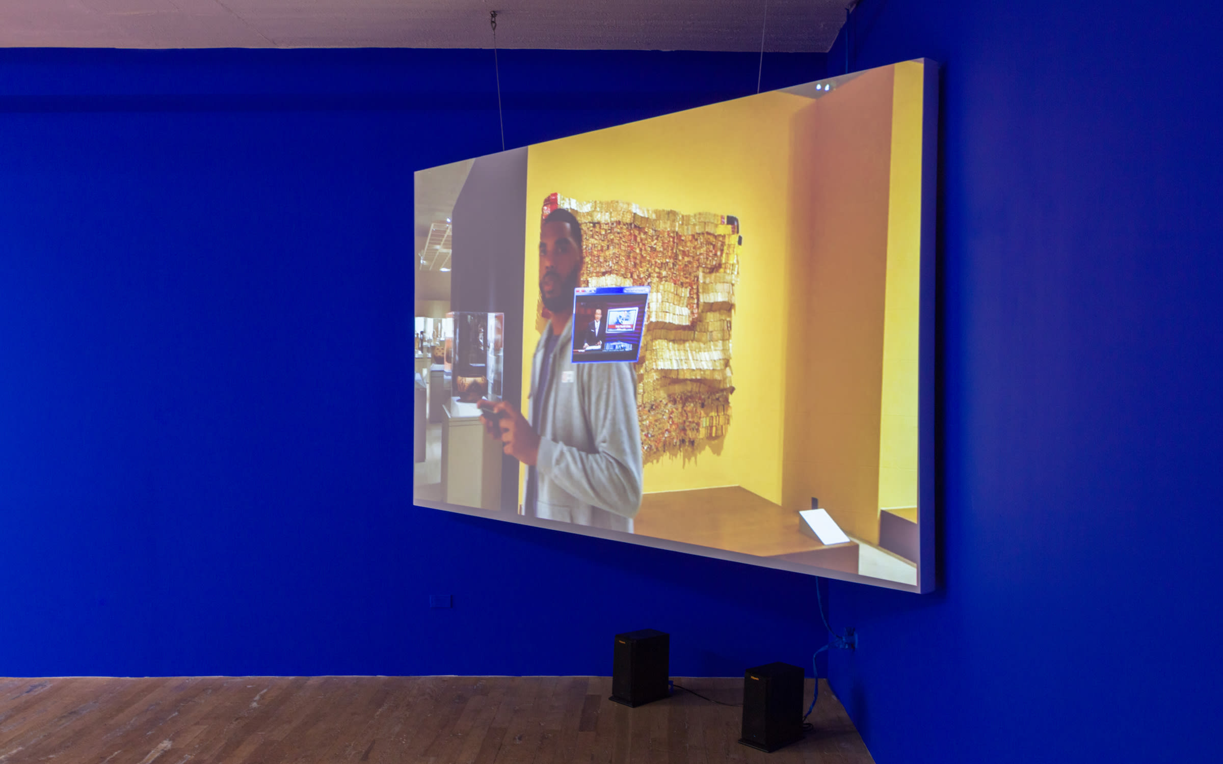 In the video, colonial spoils from the African art collections at the Metropolitan Museum in New York and the British Museum in London appear as 3D models superimposed on her footage of those museums' galleries.