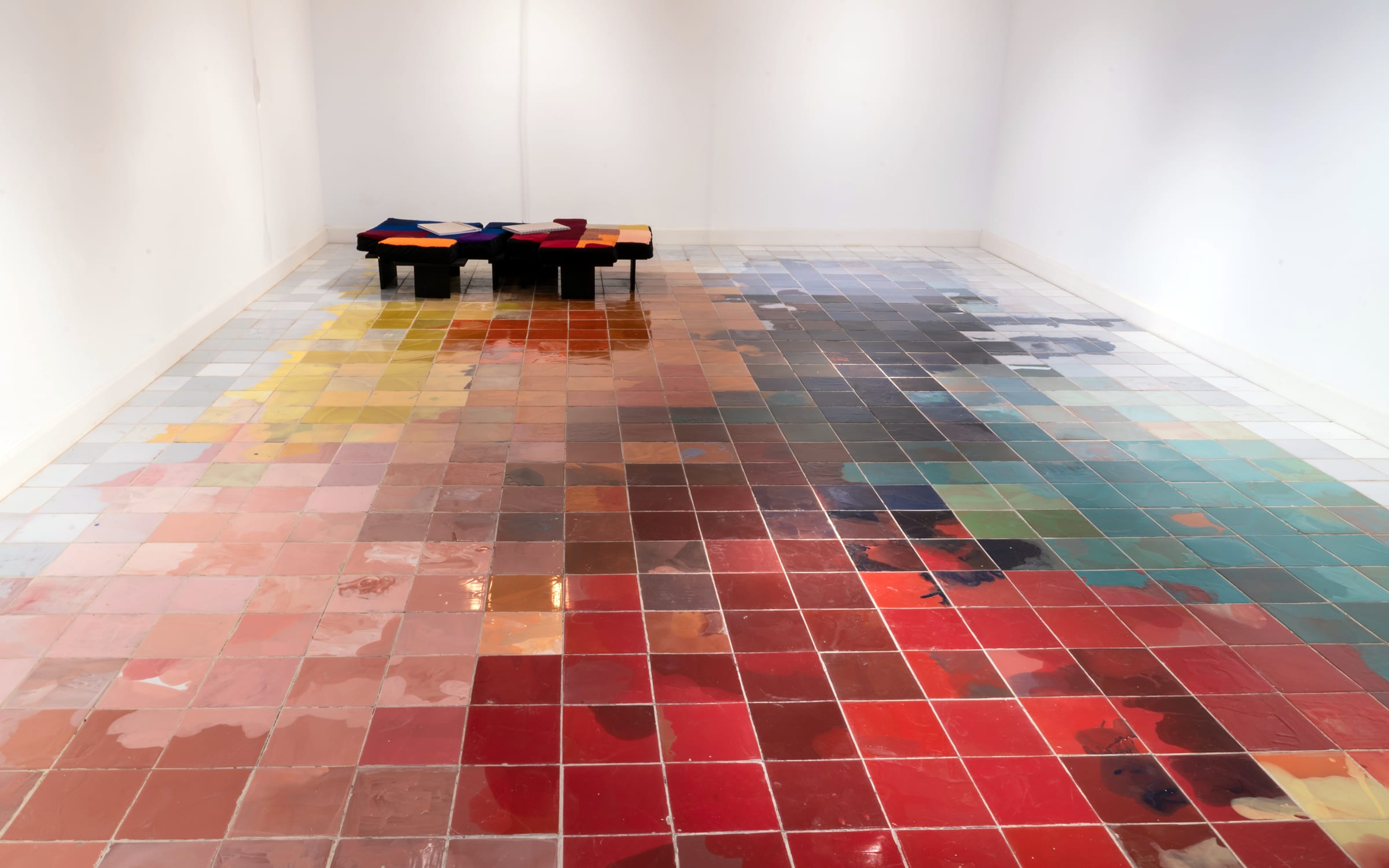 As part of Marina De Caro’s exhibition at Museo de la Inmigración in late 2018, Cromoactivismo painted the floor in a new spectrum of shades that overlapped the tiles’ borders. The installation served as a reading room for the group’s first publication. Image courtesy of the artists. Photo courtesy of UNTREF Media.
