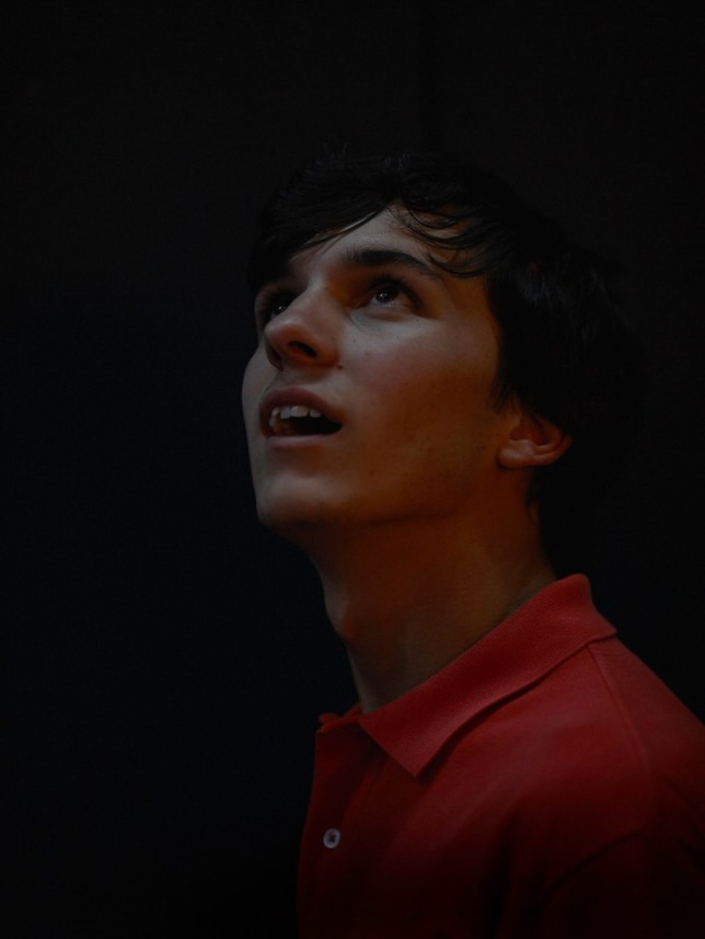 Man in Red Polo Shirt Looking Up, 42nd Street
