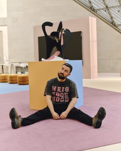 From Anne Frank mania to theme parks, the artist stages the performance of contemporary life in his largest solo exhibition to date 