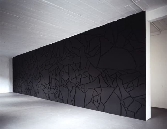 Black Styrofoam on Black Wall