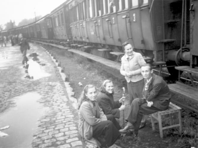 Kassel railroad station, waiting to be transported to another camp, 1948