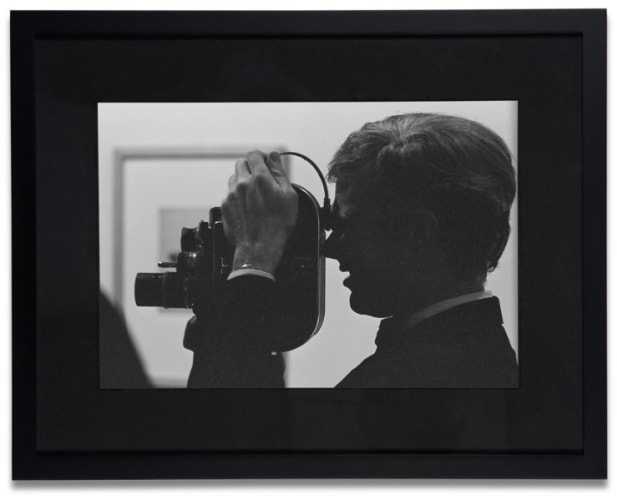 Andy Warhol (with Camera at Ferus Gallery)