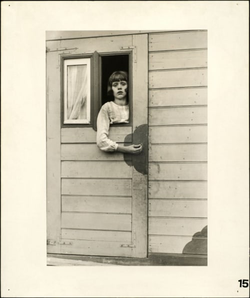 Girl in a circus caravan, 1926