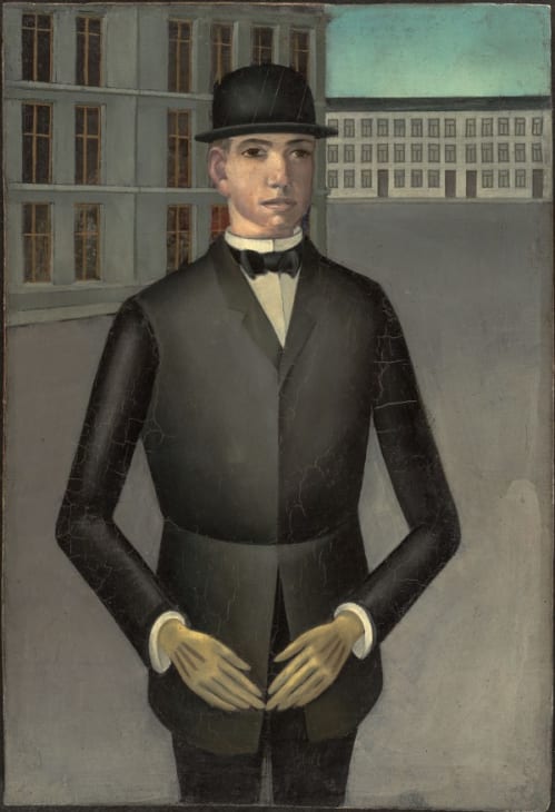 Young man with yellow gloves