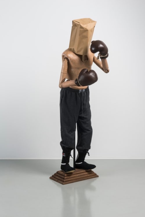 Boxer figurine with bag over the head