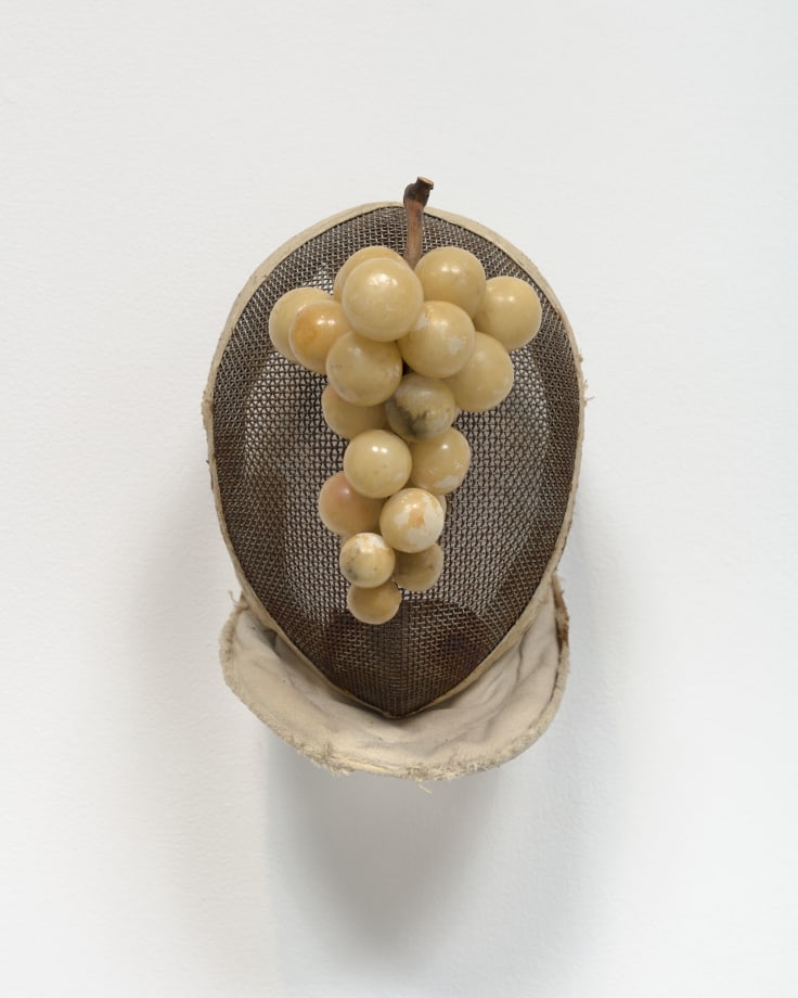 Fencing mask with alabaster grapes by Allison Janae Hamilton